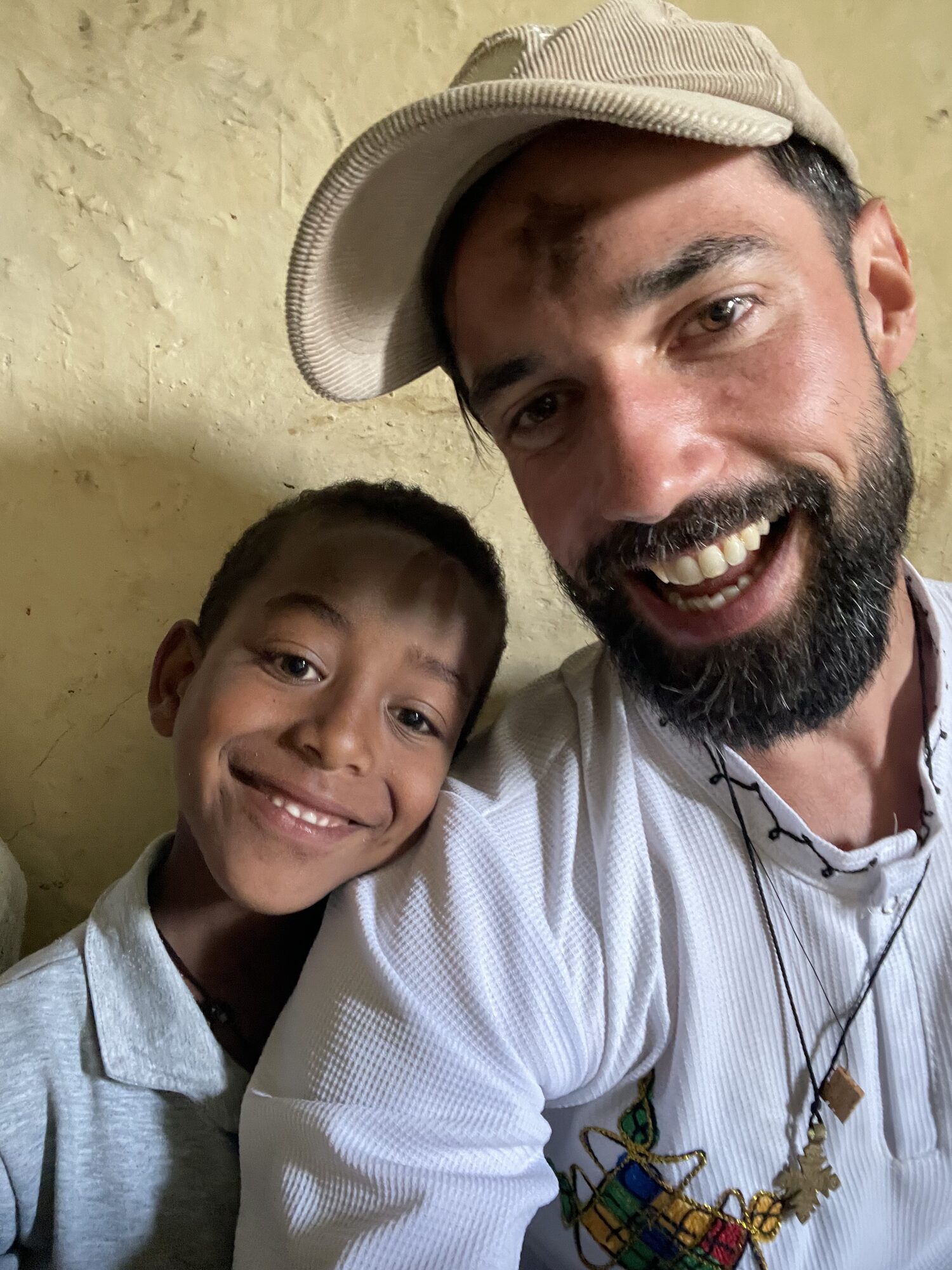 Antonin and a smiling child