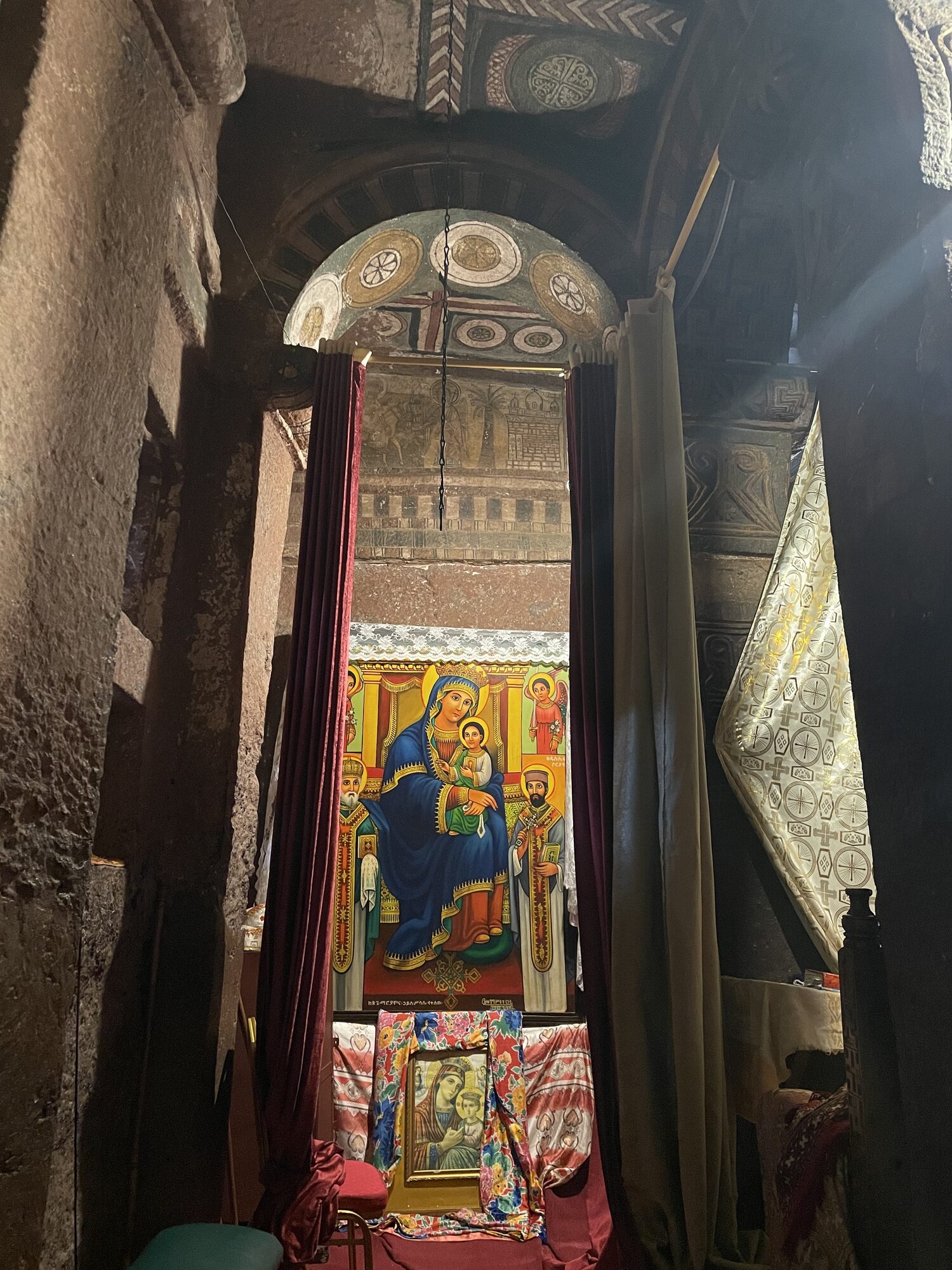 Ancient Madonna icon illuminated by soft light in a Lalibela church